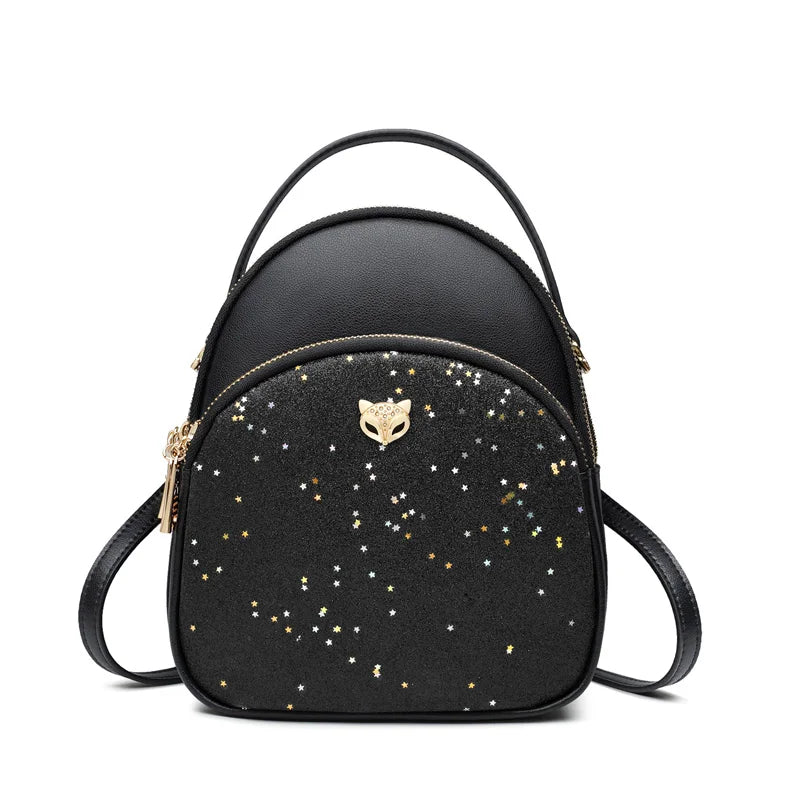 Mini Mochila FOXER de Cuero para mujer- PU Negra con Glitter Estelar y Charm de Zorro
