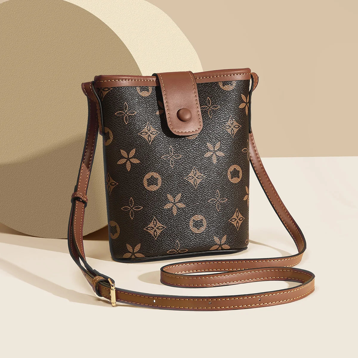 Mini Bolso Bandolera FOXER "Bucket" para mujer con Monograma Clásico | Portacelular Elegante