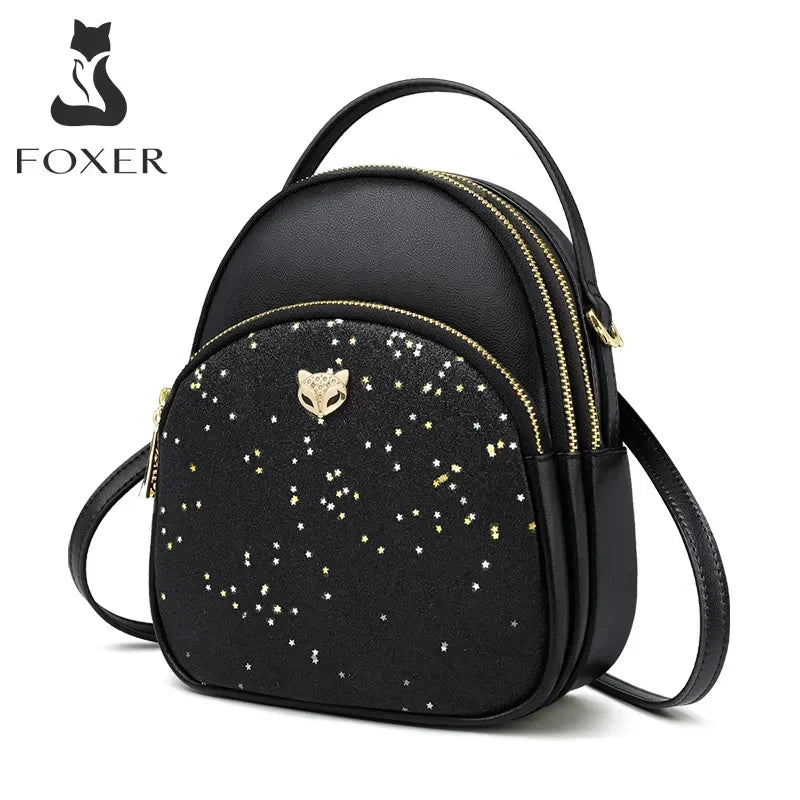 Mini Mochila FOXER de Cuero para mujer- PU Negra con Glitter Estelar y Charm de Zorro