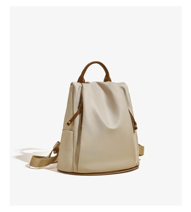 Mochila de tela FOXER 2025 Casual Antirrobo en Nylon Impermeable | Estilo Beige/Nude Elegante