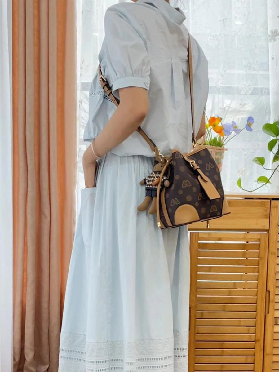 Bolso Cubo (Bucket Bag) FOXER - Monogram y Encanto moda femenina