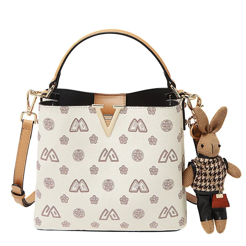 Bolso Bucket FOXER 2025 - Lujo Monogram Bandolera con Toque Juguetón