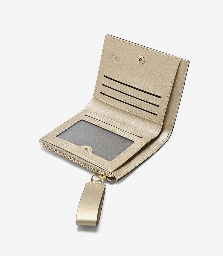 Billetera Compacta FOXER Spillt 2025: Esencialismo Elegante en Rosa Rubor