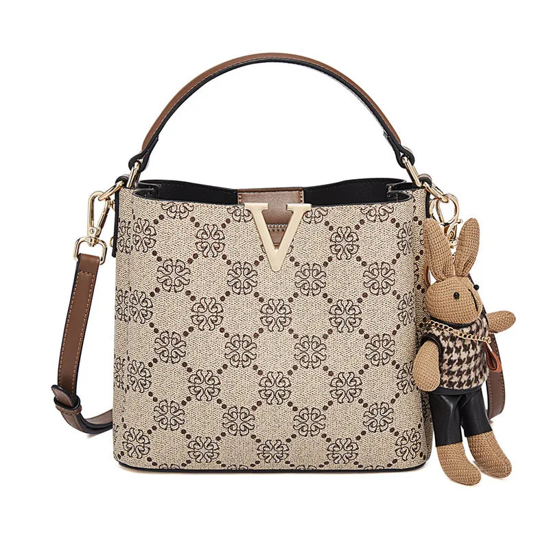 Bolso Bucket FOXER 2025 - Lujo Monogram Bandolera con Toque Juguetón