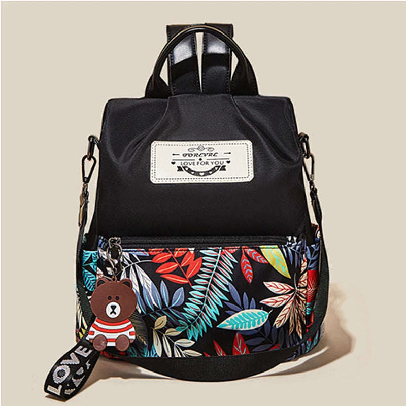 Mochila FOXER para mujer "Aventura Tropical" con Estampado Vibrante- Escolar con Antirrobo.